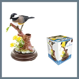 Dekoratív madár figura – faágon ülő énekesmadár virágokkal BB1